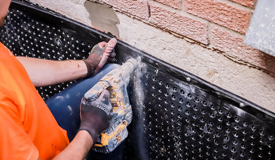 Basement foundation excavation for exterior waterproofing service