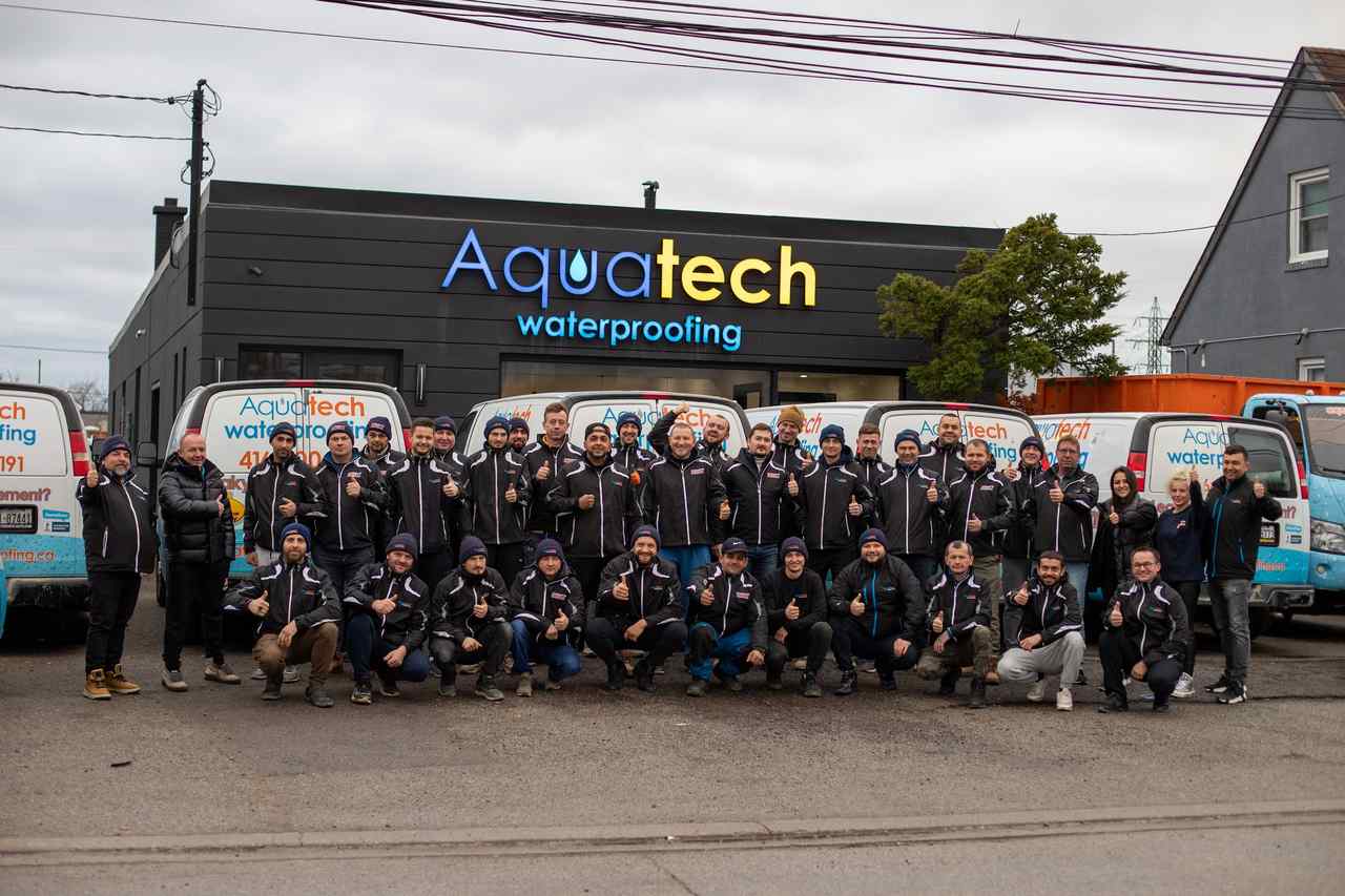 aquatech waterproofing team storefront thumbsup 01